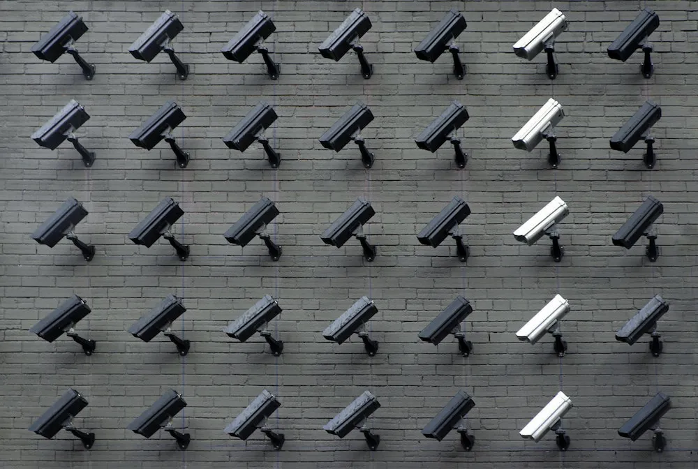surveillance cameras covering a wall