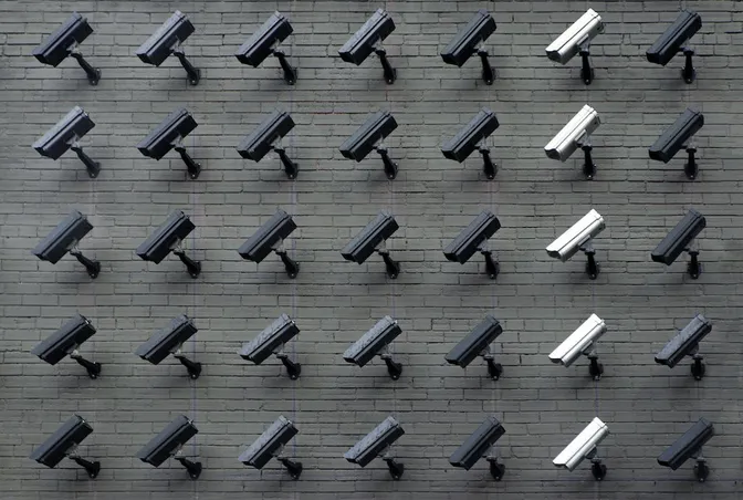 surveillance cameras covering a wall