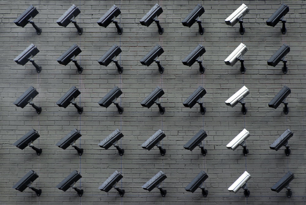 surveillance cameras covering a wall